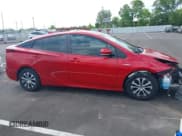 ✅ 2021 Toyota Prius LE • VIN: JTDL9MFU0M3029880 • Lot: 42450003. Listed on IAAI with 91,558 mi. Free auction sales archive from the USA and detailed vehicle history report at DreamBid. Image 13.