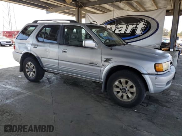 ✅ 1998 Honda Passport LX • VIN: 4S6CM58W3W4408746 • Lot: 66894325. Listed on Copart with 311,552 mi. Free auction sales archive from the USA and detailed vehicle history report at DreamBid. Image 4.