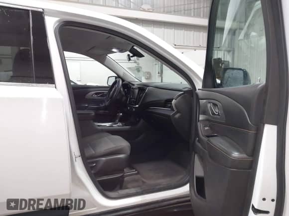 2018 Chevrolet Traverse LS with VIN 1GNEVFKW7JJ232142, listed as a IAAI auction lot 43253627 with 166,362 mi miles and . Bid and sale history available at DreamBid. Image 5.