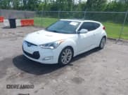 ✅ 2012 Hyundai Veloster w/Gray Int • VIN: KMHTC6ADXCU050034 • Lot: 42506584. Wystawiony na IAAI z przebiegiem 142 514 mil. Bezpłatny archiwum sprzedaży aukcyjnych z USA i szczegółowy raport historii pojazdu na DreamBid. Zdjęcie 2.