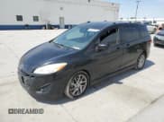 ✅ 2012 Mazda 5 Grand Touring • VIN: JM1CW2DL1C0136900 • Лот: 68957565. Опубликован ранее на Copart с пробегом 185 744 миль. Бесплатный доступ к архиву аукционных продаж из США и подробный отчёт об истории автомобиля на DreamBid. Изображение 1.