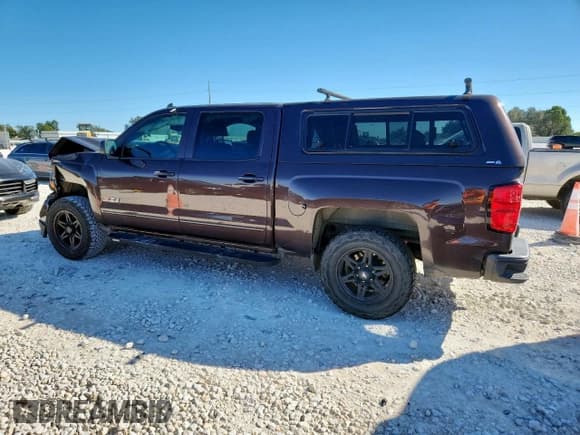 ✅ 2016 Chevrolet Silverado 1500 LT • VIN: 3GCUKREC1GG208316 • Лот: 86545855. Опубликован ранее на Copart с пробегом 130 807 миль. Бесплатный доступ к архиву аукционных продаж из США и подробный отчёт об истории автомобиля на DreamBid. Изображение 2.