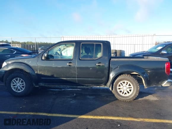 ✅ 2019 Nissan Frontier SV • VIN: 1N6AD0EVXKN730014 • Lot: 43554724. Listed on IAAI with 128,341 mi. Free auction sales archive from the USA and detailed vehicle history report at DreamBid. Image 14.
