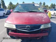 ✅ 2004 Honda Odyssey EX-L • VIN: 5FNRL18044B062243 • Лот: 43161084. Опубликован ранее на IAAI с пробегом 160 964 миль. Бесплатный доступ к архиву аукционных продаж из США и подробный отчёт об истории автомобиля на DreamBid. Изображение 6.