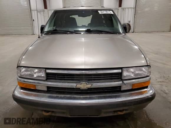 1999 Chevrolet Blazer LT z VIN 1GNDT13W3X2151872, wystawiony jako Copart lot #50419615 z przebiegiem 94 520 mil mil oraz Szkoda całkowita • Salvage title. Historia ofert i sprzedaży dostępna na DreamBid. Obrazek 5.