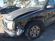 ✅ 2003 Toyota Tacoma • VIN: 5TEVL52N13Z226278 • Lot: 43800077. Listed on IAAI with 196,180 mi. Free auction sales archive from the USA and detailed vehicle history report at DreamBid. Image 6.