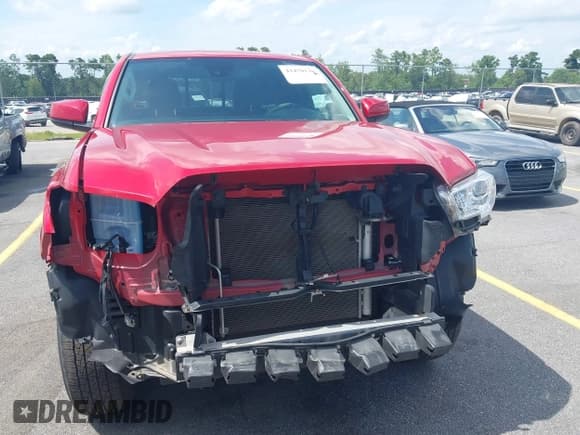 ✅ 2022 Toyota Tacoma SR • VIN: 3TYSX5EN1NT014391 • Lot: 42470136. Listed on IAAI with 31,720 mi. Free auction sales archive from the USA and detailed vehicle history report at DreamBid. Image 13.