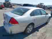 2013 Chevrolet Impala LS z VIN 2G1WF5E35D1265220, wystawiony jako IAAI lot #42559869 z przebiegiem 124 046 mil mil oraz . Historia ofert i sprzedaży dostępna na DreamBid. Obrazek 4.