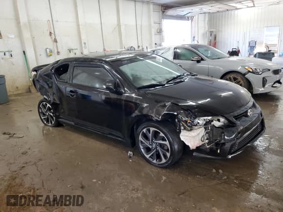 ✅ 2012 Scion tC • VIN: JTKJF5C70C3024268 • Lot: 84947935. Listed on Copart with 182,506 mi. Free auction sales archive from the USA and detailed vehicle history report at DreamBid. Image 4.