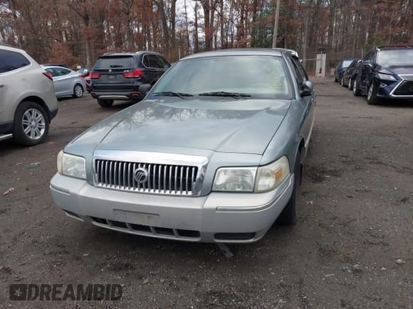 ✅ 2006 Mercury Grand Marquis GS • VIN: 2MEFM74V46X641111 • Лот: 43668346. Опубликован ранее на IAAI с пробегом Не указан. Бесплатный доступ к архиву аукционных продаж из США и подробный отчёт об истории автомобиля на DreamBid. Изображение 6.