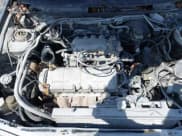 ✅ 1994 Mazda Protege DX • VIN: JM1BG2249R0774647 • Lot: 42093689. Wystawiony na IAAI z przebiegiem 89 376 mil. Bezpłatny archiwum sprzedaży aukcyjnych z USA i szczegółowy raport historii pojazdu na DreamBid. Zdjęcie 10.