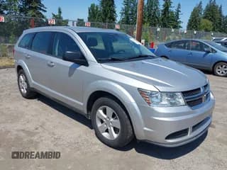 ✅ 2013 Dodge Journey SE • VIN: 3C4PDCAB3DT552847 • Lot: 42409901. Listed on IAAI with 97,482 mi. Free auction sales archive from the USA and detailed vehicle history report at DreamBid. Image 1.