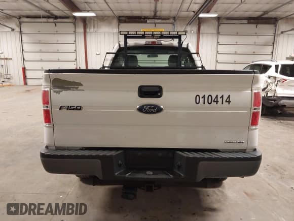 ✅ 2014 Ford F-150 XL • VIN: 1FTMF1EM4EKD69618 • Lot: 43404212. Listed on IAAI with 112,364 mi. Free auction sales archive from the USA and detailed vehicle history report at DreamBid. Image 16.