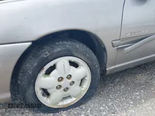 ✅ 1998 Dodge Neon • VIN: 1B3ES42YXWD746520 • Lot: 42149526. Listed on IAAI with 197,299 mi. Free auction sales archive from the USA and detailed vehicle history report at DreamBid. Image 6.