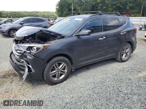 2018 Hyundai Santa Fe 2.4L with VIN 5XYZU3LB7JG513154, listed as a Copart auction lot 71161875 with 75,398 mi miles and Salvage title. Bid and sale history available at DreamBid. Image 1.