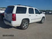 ✅ 2011 Chevrolet Tahoe LTZ • VIN: 1GNSCCE03BR397672 • Lot: 42775981. Listed on IAAI with 210,316 mi. Free auction sales archive from the USA and detailed vehicle history report at DreamBid. Image 4.