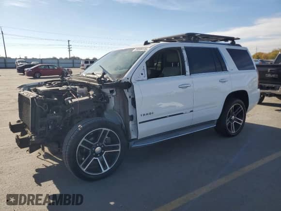 2015 Chevrolet Tahoe LTZ with VIN 1GNSKCKC1FR118128, listed as a Copart auction lot 89589135 with 129,932 mi miles and Salvage title. Bid and sale history available at DreamBid. Image 1.