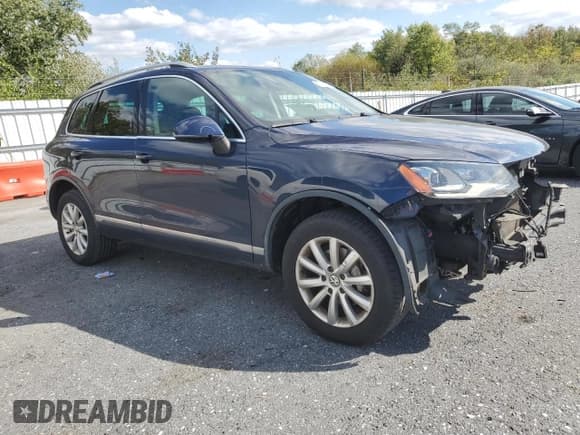 ✅ 2012 Volkswagen Touareg Sport • VIN: WVGFF9BP4CD000230 • Лот: 85337545. Опубликован ранее на Copart с пробегом 148 732 миль. Бесплатный доступ к архиву аукционных продаж из США и подробный отчёт об истории автомобиля на DreamBid. Изображение 4.