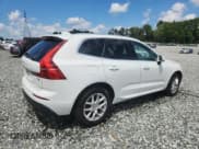 ✅ 2019 Volvo XC60 Momentum • VIN: LYV102DK2KB200699 • Lot: 64007825. Listed on Copart with 117,310 mi. Free auction sales archive from the USA and detailed vehicle history report at DreamBid. Image 3.