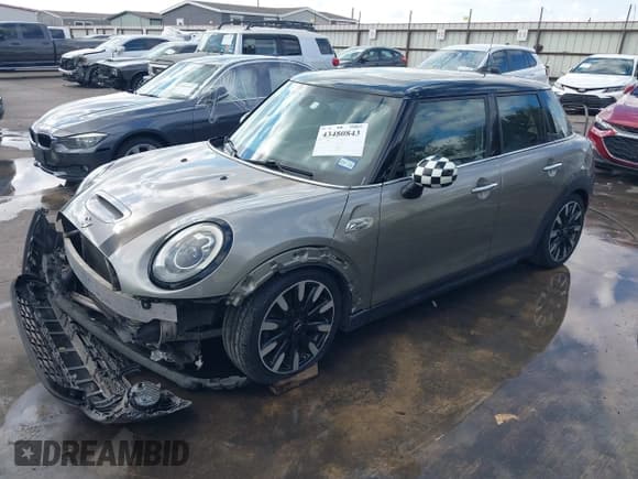 ✅ 2018 MINI Hardtop 4 Door Cooper S • VIN: WMWXU3C59J2F49827 • Lot: 43480843. Listed on IAAI with 69,237 mi. Free auction sales archive from the USA and detailed vehicle history report at DreamBid. Image 2.