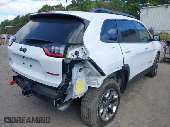 ✅ 2019 Jeep Cherokee Trailhawk • VIN: 1C4PJMBX5KD216306 • Lot: 43300199. Listed on IAAI with 103,599 mi. Free auction sales archive from the USA and detailed vehicle history report at DreamBid. Image 4.