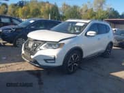 ✅ 2017 Nissan Rogue SV • VIN: JN8AT2MT2HW148045 • Lot: 43544582. Listed on IAAI with 115,334 mi. Free auction sales archive from the USA and detailed vehicle history report at DreamBid. Image 2.