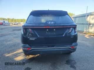 2023 Hyundai Tucson SEL with VIN 5NMJBCAE2PH279827, listed as a Copart auction lot 82166985 with 65,784 mi miles and Salvage title. Bid and sale history available at DreamBid. Image 6.