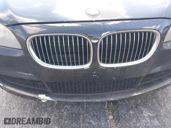 ✅ 2012 BMW 7 Series 740i • VIN: WBAKA4C50CDS99293 • Lot: 42208510. Listed on IAAI with 127,631 mi. Free auction sales archive from the USA and detailed vehicle history report at DreamBid. Image 14.