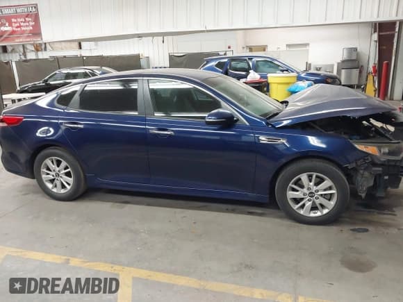 ✅ 2018 Kia Optima LX • VIN: 5XXGT4L35JG197010 • Lot: 43615325. Listed on IAAI with 162,408 mi. Free auction sales archive from the USA and detailed vehicle history report at DreamBid. Image 13.