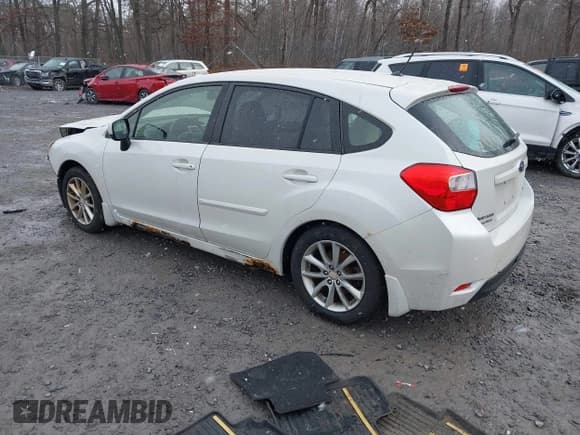 ✅ 2012 Subaru Impreza Premium • VIN: JF1GPAC61CH228262 • Lot: 43804230. Listed on IAAI with 131,568 mi. Free auction sales archive from the USA and detailed vehicle history report at DreamBid. Image 3.