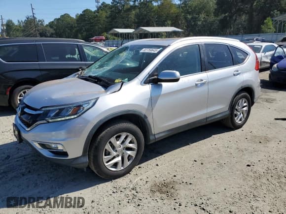 ✅ 2015 Honda CR-V EX-L • VIN: 2HKRM4H7XFH671126 • Лот: 82759645. Опубликован ранее на Copart с пробегом 57 789 миль. Бесплатный доступ к архиву аукционных продаж из США и подробный отчёт об истории автомобиля на DreamBid. Изображение 1.