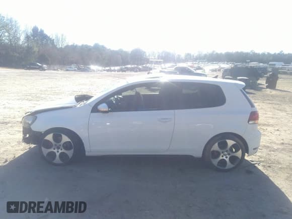 ✅ 2012 Volkswagen Golf GTI w/Conv & Sunroof • VIN: WVWEV7AJ5CW094384 • Lot: 41744860. Listed on IAAI with 157,285 mi. Free auction sales archive from the USA and detailed vehicle history report at DreamBid. Image 15.