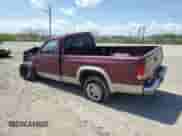2000 Dodge Dakota Sport z VIN 1B7GG26N5YS546673, wystawiony jako Copart lot #54512715 z przebiegiem 140 904 mil mil oraz Czysty tytuł • Clean title. Historia ofert i sprzedaży dostępna na DreamBid. Obrazek 2.