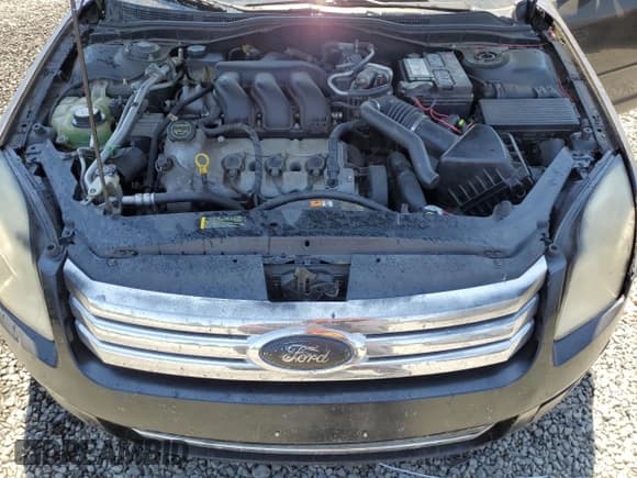 ✅ 2006 Ford Fusion SE • VIN: 3FAFP07156R174584 • Lot: 60071435. Wystawiony na Copart z przebiegiem 175 984 mil. Bezpłatny archiwum sprzedaży aukcyjnych z USA i szczegółowy raport historii pojazdu na DreamBid. Zdjęcie 11.