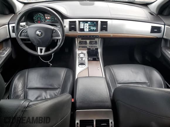 ✅ 2014 Jaguar XF T • VIN: SAJWA0ES2EPU18464 • Lot: 59681445. Listed on Copart with 165,733 mi. Free auction sales archive from the USA and detailed vehicle history report at DreamBid. Image 8.