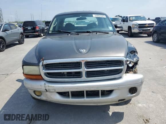 2002 Dodge Dakota SLT z VIN 1B7HL48X52S688636, wystawiony jako Copart lot #53062325 z przebiegiem 224 011 mil mil oraz Szkoda całkowita • Salvage title. Historia ofert i sprzedaży dostępna na DreamBid. Obrazek 5.