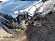 ✅ 2021 Kia Sportage EX • VIN: KNDPNCAC3M7909678 • Lot: 43219705. Wystawiony na IAAI z przebiegiem 96 833 mil. Bezpłatny archiwum sprzedaży aukcyjnych z USA i szczegółowy raport historii pojazdu na DreamBid. Zdjęcie 6.