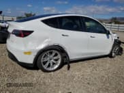 ✅ 2021 Tesla Model Y Long Range • VIN: 5YJYGDEE1MF274521 • Lot: 82581005. Listed on Copart with 49,849 mi. Free auction sales archive from the USA and detailed vehicle history report at DreamBid. Image 3.