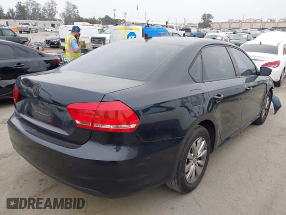 ✅ 2015 Volkswagen Passat Limited Edition • VIN: 1VWAT7A38FC021387 • Lot: 42723698. Listed on IAAI with 69,198 mi. Free auction sales archive from the USA and detailed vehicle history report at DreamBid. Image 4.