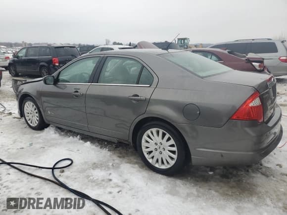 ✅ 2011 Ford Fusion Hybrid • VIN: 3FADP0L30BR198252 • Lot: 85644784. Listed on Copart with 111,528 mi. Free auction sales archive from the USA and detailed vehicle history report at DreamBid. Image 2.