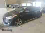 2013 Hyundai Veloster Turbo z VIN KMHTC6AE9DU099817, wystawiony jako Copart lot #70261685 z przebiegiem 293 082 mil mil oraz Czysty tytuł • Clean title. Historia ofert i sprzedaży dostępna na DreamBid. Obrazek 1.