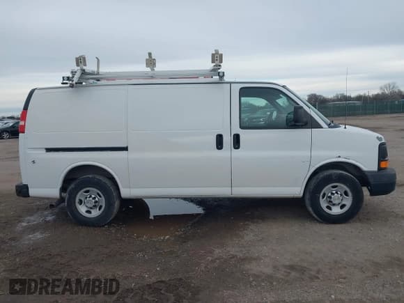 ✅ 2013 Chevrolet Express Cargo • VIN: 1GCWGFCAXD1140635 • Lot: 43410975. Listed on IAAI with 185,343 mi. Free auction sales archive from the USA and detailed vehicle history report at DreamBid. Image 13.