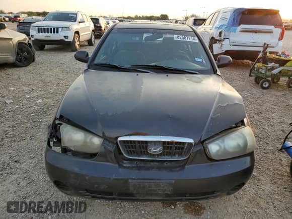 2003 Hyundai Elantra GLS z VIN KMHDN45D53U572664, wystawiony jako Copart lot #82387214 z przebiegiem Nie podano mil oraz Szkoda całkowita • Salvage title. Historia ofert i sprzedaży dostępna na DreamBid. Obrazek 5.