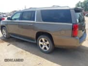 ✅ 2015 Chevrolet Suburban LT • VIN: 1GNSCJKC0FR513631 • Lot: 42879095. Wystawiony na IAAI z przebiegiem 239 851 mil. Bezpłatny archiwum sprzedaży aukcyjnych z USA i szczegółowy raport historii pojazdu na DreamBid. Zdjęcie 3.