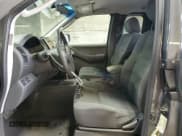 ✅ 2009 Nissan Frontier SE • VIN: 1N6AD06W79C422005 • Lot: 64131655. Listed on Copart with 152,336 mi. Free auction sales archive from the USA and detailed vehicle history report at DreamBid. Image 7.