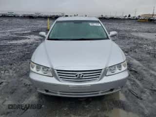 2007 Hyundai Azera SE z VIN KMHFC46F47A202070, wystawiony jako Copart lot #80811434 z przebiegiem 98 692 mil mil oraz Szkoda całkowita • Salvage title. Historia ofert i sprzedaży dostępna na DreamBid. Obrazek 5.