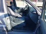 ✅ 1999 Mercedes-Benz M 320/430/500 • VIN: 4JGAB54E3XA100885 • Lot: 43853117. Listed on IAAI with 194,865 mi. Free auction sales archive from the USA and detailed vehicle history report at DreamBid. Image 5.