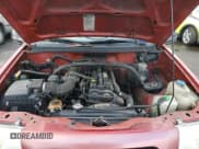 ✅ 2000 Suzuki Vitara JX • VIN: 2S3TD52V9Y6100173 • Лот: 86200824. Опубликован ранее на Copart с пробегом Не указан. Бесплатный доступ к архиву аукционных продаж из США и подробный отчёт об истории автомобиля на DreamBid. Изображение 11.