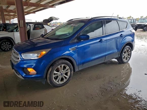 ✅ 2018 Ford Escape SE • VIN: 1FMCU9GD2JUA91292 • Lot: 94795905. Wystawiony na Copart z przebiegiem 79 291 mil. Bezpłatny archiwum sprzedaży aukcyjnych z USA i szczegółowy raport historii pojazdu na DreamBid. Zdjęcie 1.