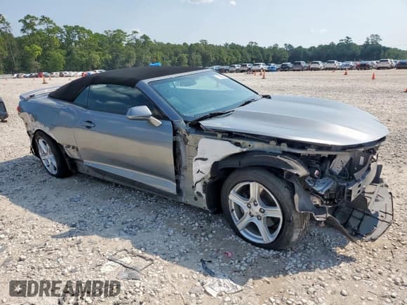 ✅ 2020 Chevrolet Camaro 1LT • VIN: 1G1FB3DX4L0119549 • Lot: 70222715. Listed on Copart with 52,827 mi. Free auction sales archive from the USA and detailed vehicle history report at DreamBid. Image 4.